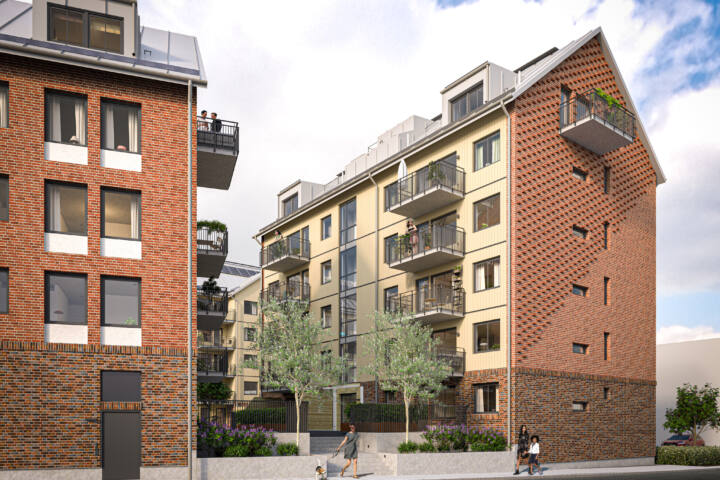 Flerbostadshus med bostadsrätter. Fasad i rött tegel och ljus träpanel.